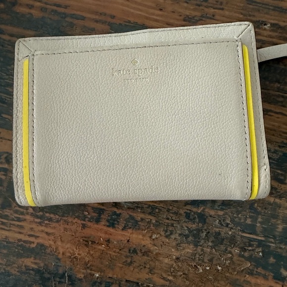kate spade Accessories - kate spade cream leather card holder with yellow trim